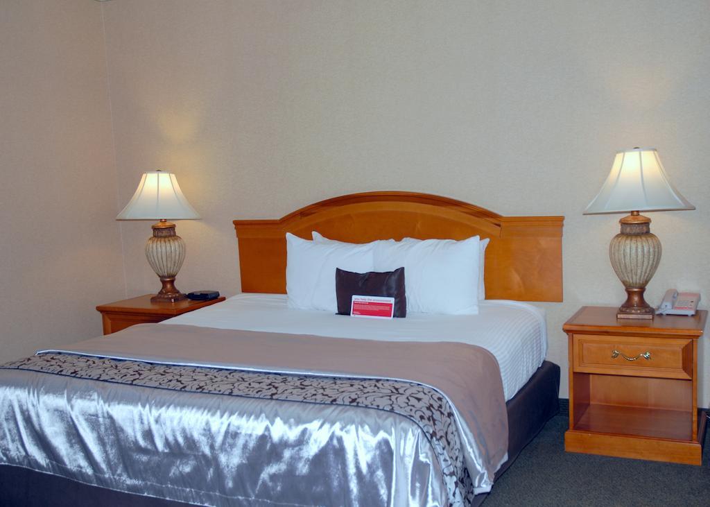 รามาดา บาย วินด์แฮม โอลิมเปีย Hotel ห้อง รูปภาพ A bed